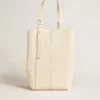 24/7 Bag North South in butter-colored leather with adjustable handles