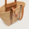24.7 tote in natural raffia and brown leather with gold metal details