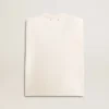 Aged white sleeveless T-shirt embellished with crystals