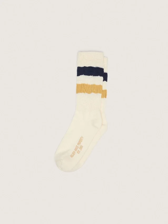 Aged-white socks with distressed details and two-tone stripes