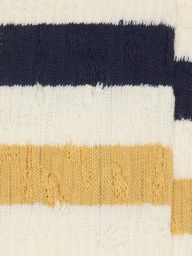 Aged-white socks with distressed details and two-tone stripes