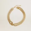 Antique gold-colored braided chain necklace with star-shaped clasp