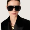 Aviator style sunglasses with black frame and lenses