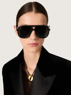 Aviator style sunglasses with black frame and lenses