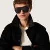 Aviator style sunglasses with black frame and lenses