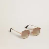 Aviator-style sunglasses with gold frame and beige lenses