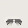 Aviator-style sunglasses with metal-colored frame and gray lenses