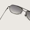 Aviator-style sunglasses with metal-colored frame and gray lenses