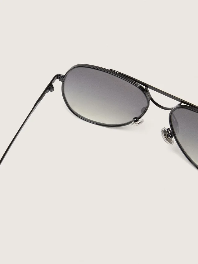 Aviator-style sunglasses with metal-colored frame and gray lenses