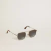Aviator style sunglasses with silver frame and blue lenses