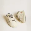 Baby School in nappa leather with musical print and white suede star