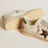Ball Star in mesh and leather with metallic leather star and heel tab