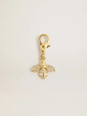 Bee-shaped charm in gold-colored brass with crystals