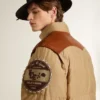 Beige bomber jacket with leather and patch details