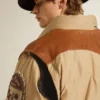 Beige bomber jacket with leather and patch details