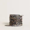 Beige leopard-print laces with contrasting white logo