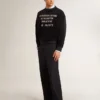 Black crew neck sweatshirt with embroidered lettering