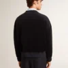 Black crew neck sweatshirt with embroidered lettering