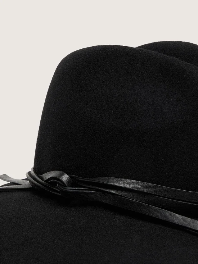 Black hat with leather strap