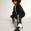 Black hooded sweatshirt with contrasting white star and logo