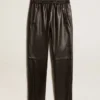 Black joggers in nappa leather with zip at the base