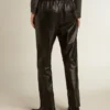 Black joggers in nappa leather with zip at the base