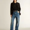 Black mesh knit top with sequins and contrasting details