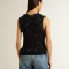 Black mesh knit top with sequins and contrasting details