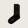 Black socks with distressed details and rhinestones