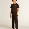 Black T-shirt with contrasting white logo on the front and maxi star on the back
