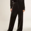 Black velvet-effect pants