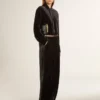 Black velvet-effect pants
