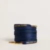 Blue cotton laces with contrasting gold-colored logo