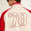 Bomber jacket in worn white and red with embroidery
