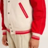 Bomber jacket in worn white and red with embroidery
