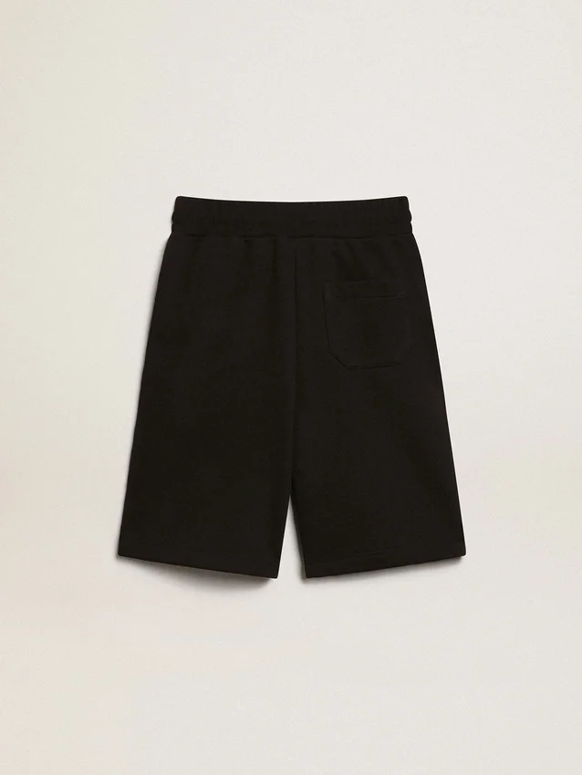 Boys’ black Bermuda shorts with white stars