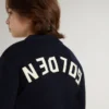 Boys’ blue crew-neck sweater with 'Golden' lettering on the back