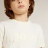 Boys' cream-colored T-shirt with raised logo