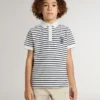 Boys' white cotton polo with navy blue stripes and embroidery