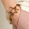Bracelet in antique gold decreasing chain with star-shaped clasp