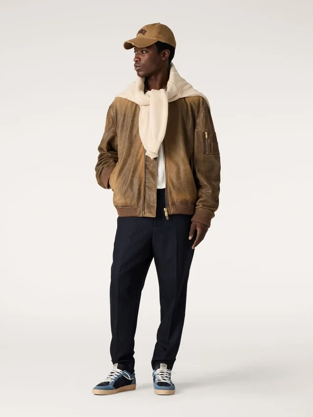 Brown leather biker jacket with a lived-in effect