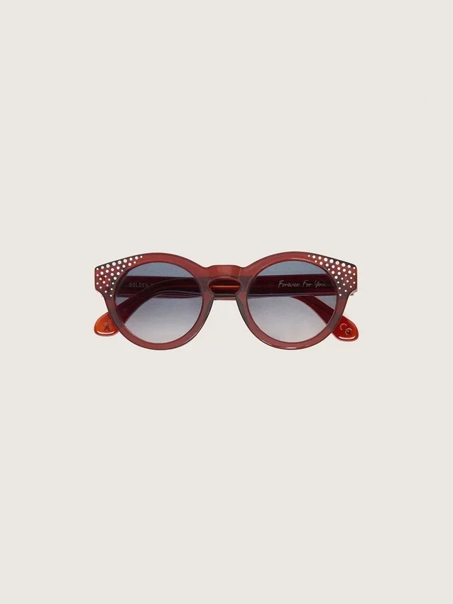 Cameron Panthos sunglasses with honey frame, precious stones and blue lenses