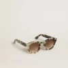 Cameron-style sunglasses with a tortoiseshell pattern