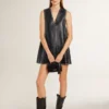 Charm in black nappa leather with studs and metal details
