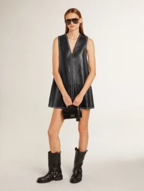 Charm in black nappa leather with studs and metal details