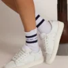 Cotton socks with distressed finishes, blue stripes and logo