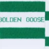Cotton socks with distressed finishes, green stripes and logo