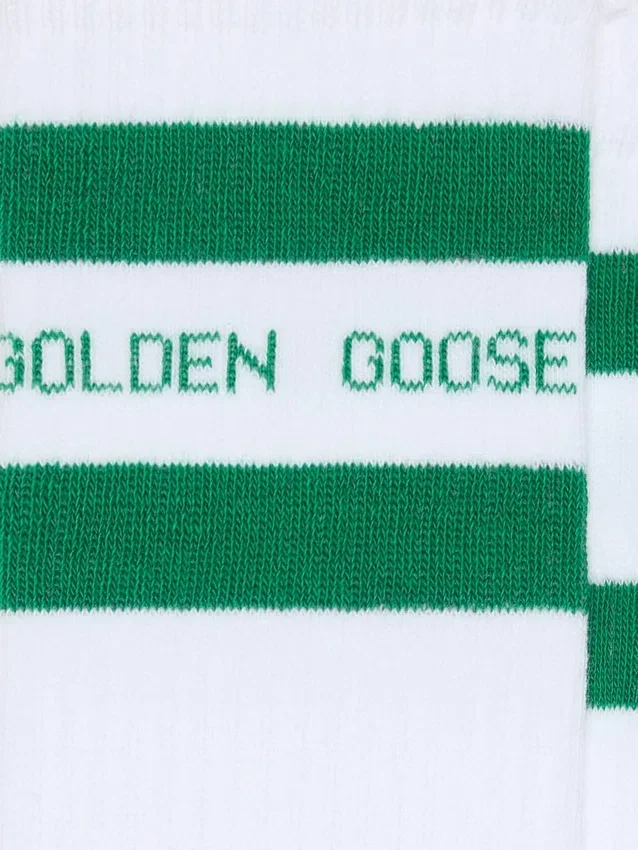 Cotton socks with distressed finishes, green stripes and logo