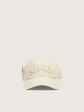Cream baseball cap with tone-on-tone "Golden" patch and green star pin