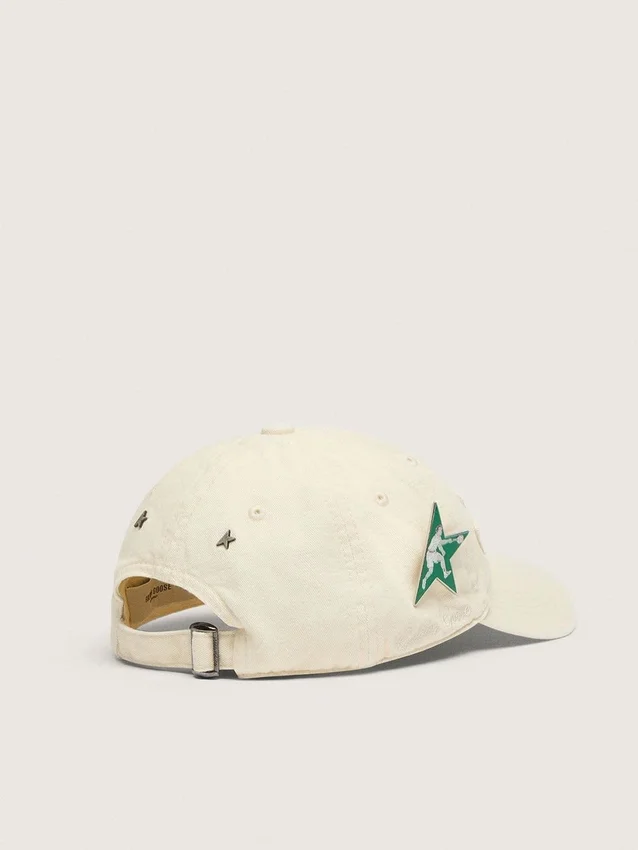Cream baseball cap with tone-on-tone "Golden" patch and green star pin